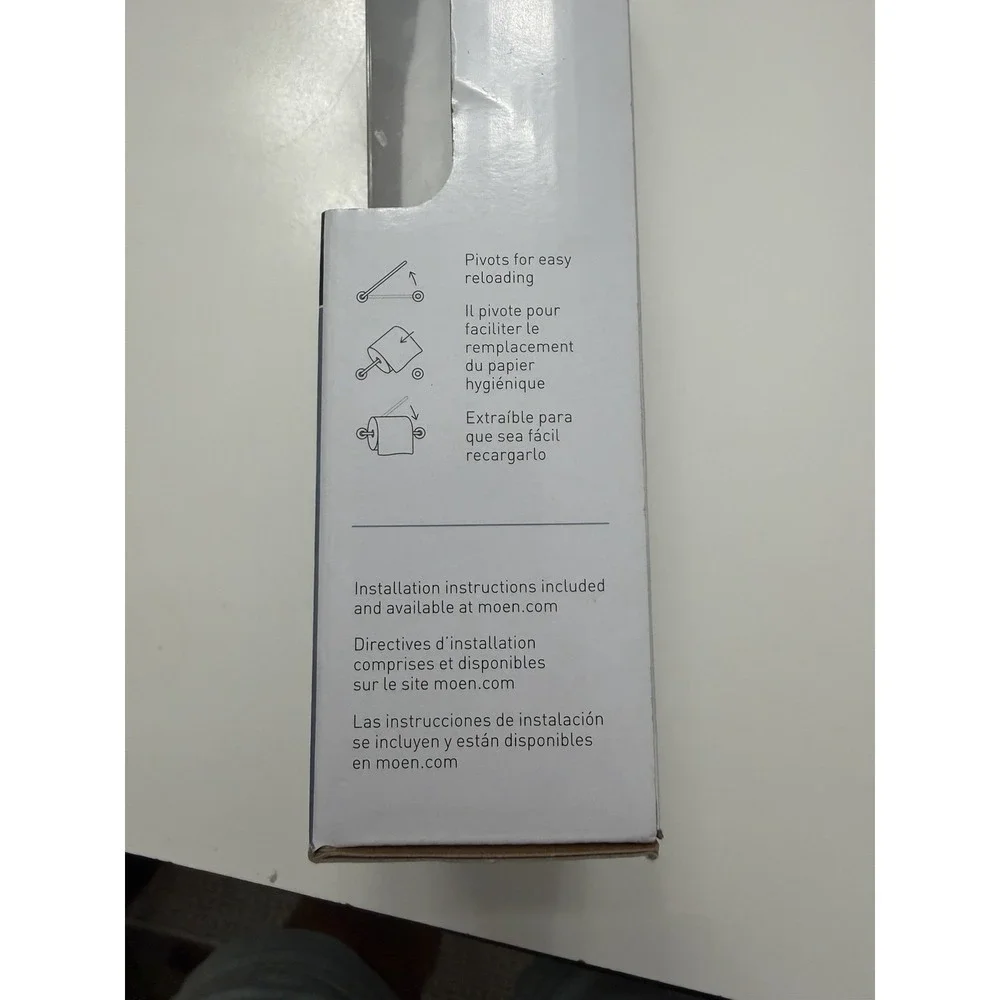 Moen Genta BH3608CH Pivoting Toilet Paper Holder Chrome New.      4032